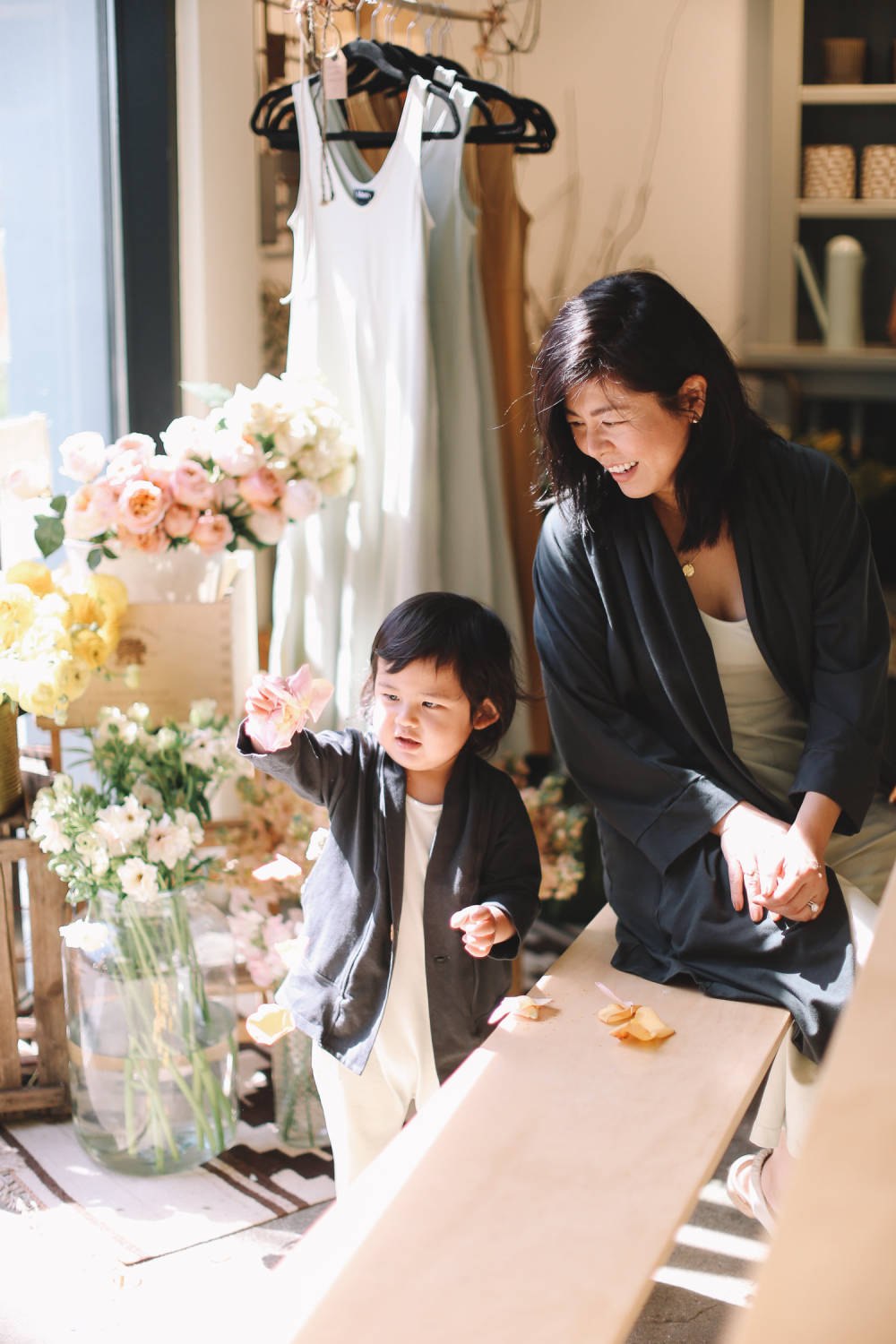 Lisa Hsieh with her son Greysen, wearing pieces from her collection. Photo: Jenna Norman