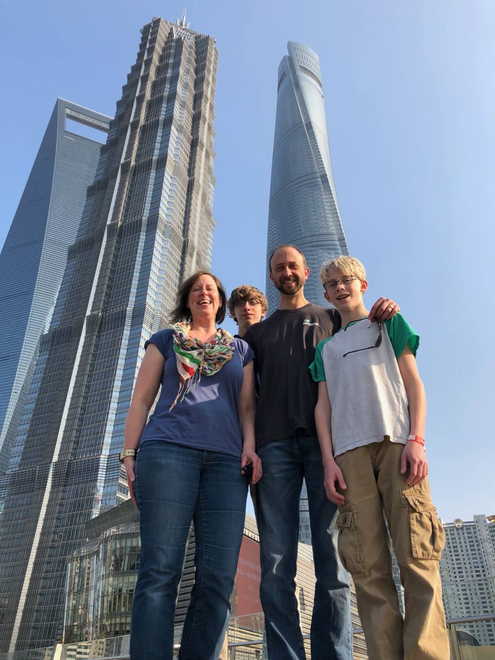 Megan Woodard Johnson with her husband Mike and two sons Evan and Zach, on a family trip to China.