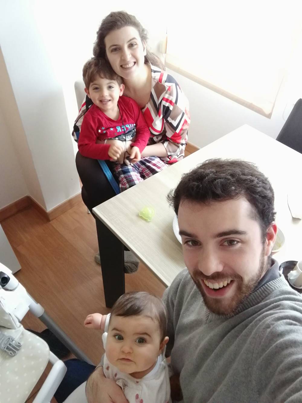 Sara Infante, with her husband João and children Estêvão and Esperança on Christmas morning. 