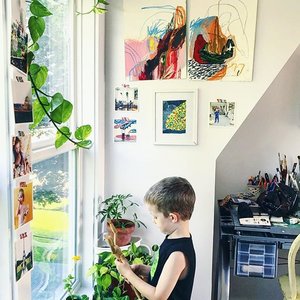 Kaylan's son, Finley, in her home studio space