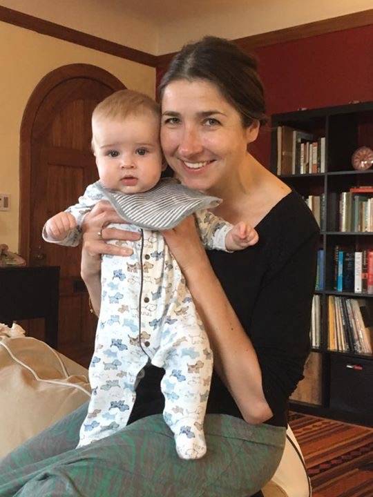 Kate at home with her son Max.