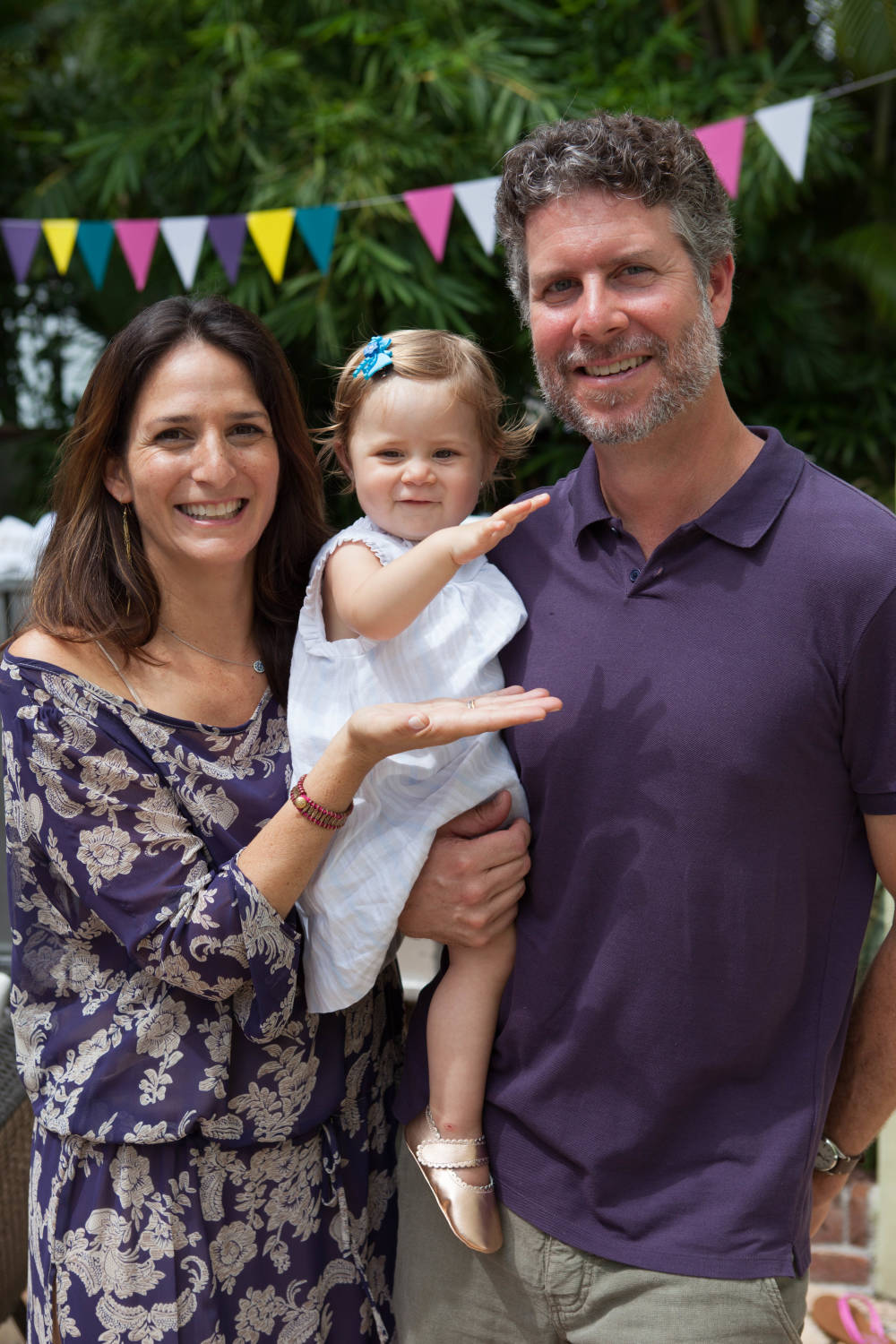 Rhonda Mitrani, with her husband and daughter Arielle Mazi, 