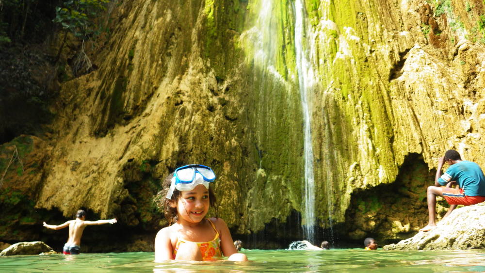 Sitora's daughter, Munisa, travelling with her in the Dominican Republic. Photo: Sitora Takanaev