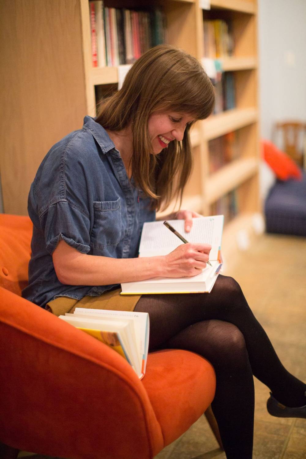 Sarah Menkedick, signing copies of her book, 'Homing Instincts'.