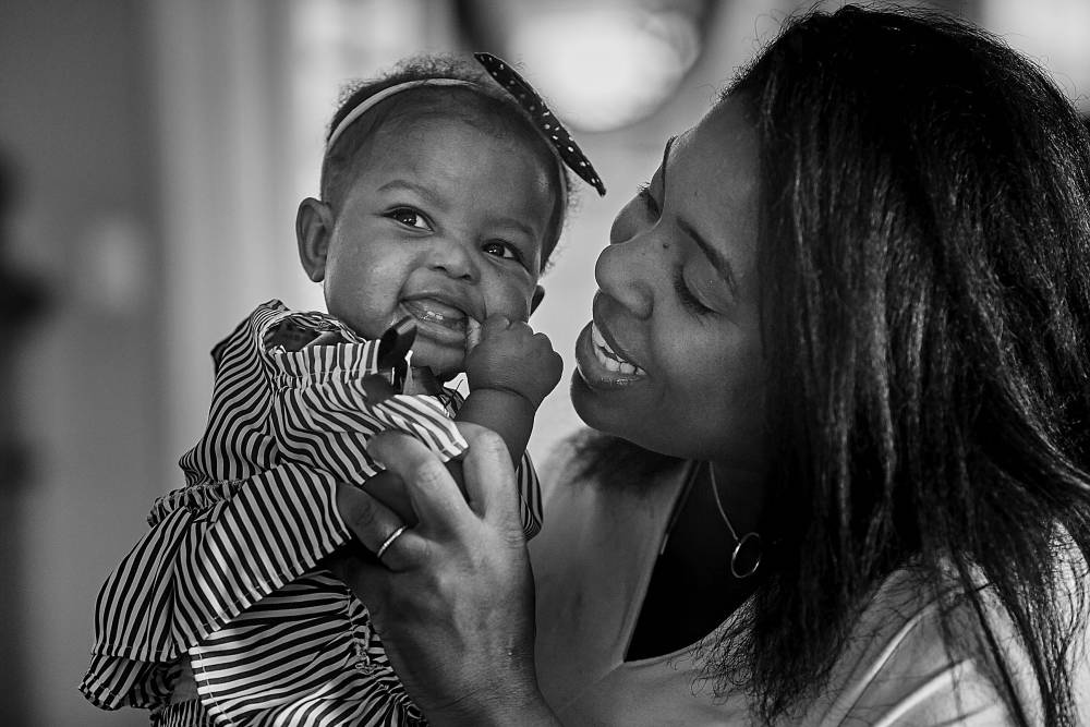 Christine Llewellyn Ohemeng with her daughter Louisa. Photo: Sobitart Photography