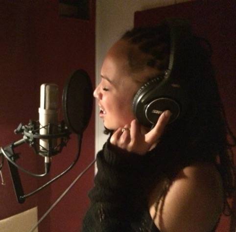 Naima Adedapo in the recording studio.