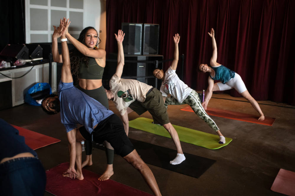 Naima Adedapo teaching yoga class in Nashville, TN.